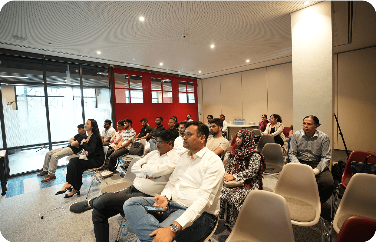 Audience engaged in the AI workshop discussion