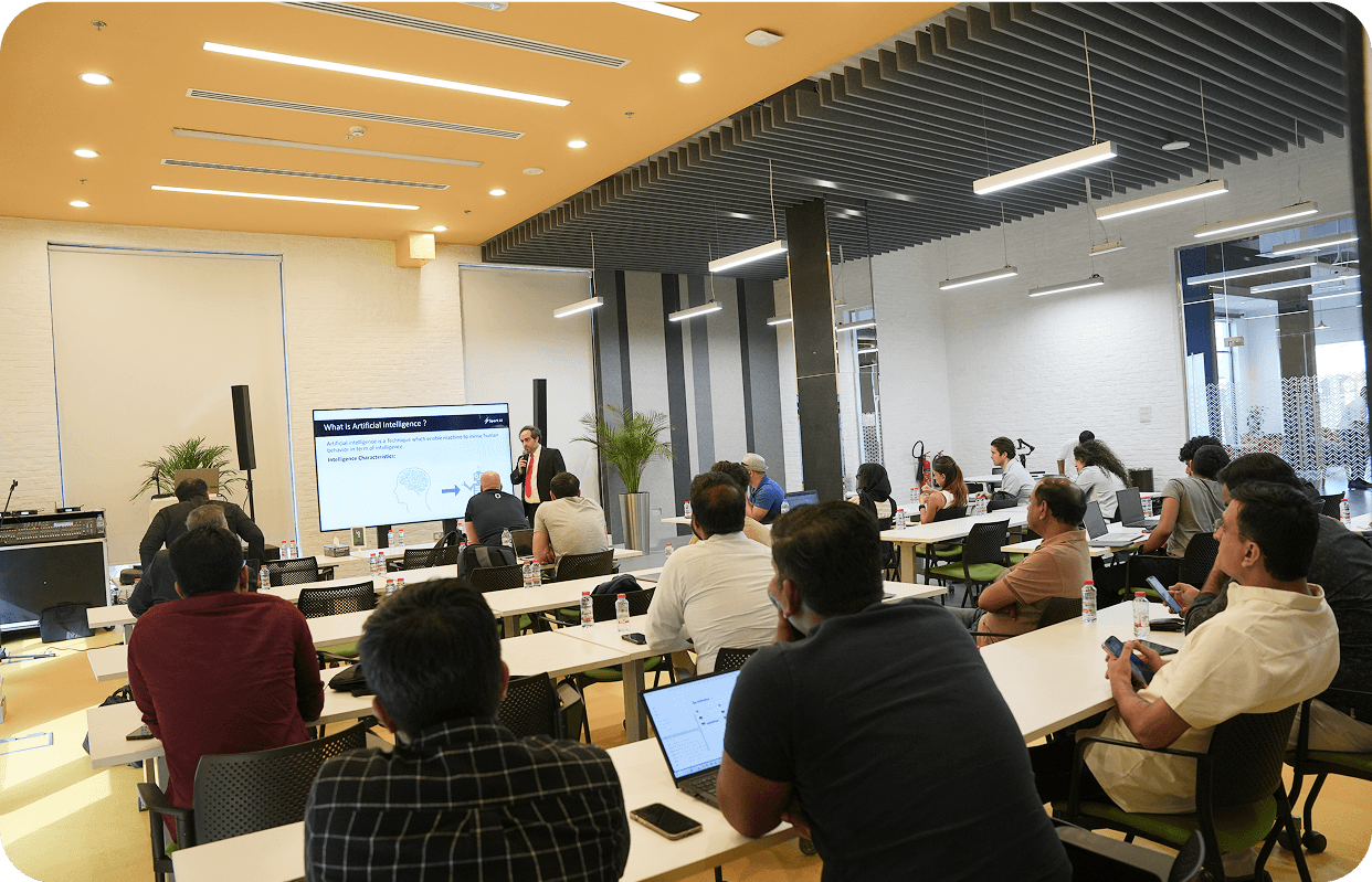 Workshop session with AI concepts on screen