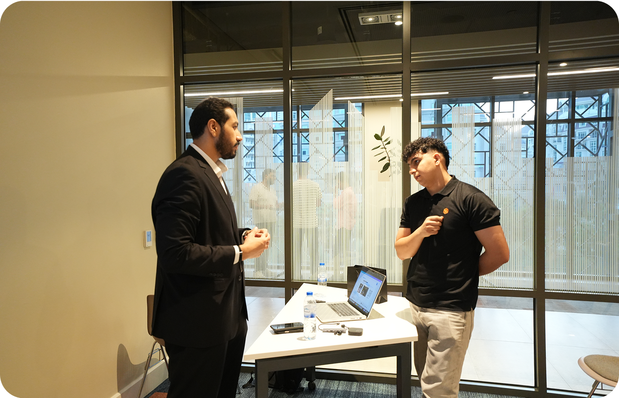 Business meeting with presentation screen showing AI concepts